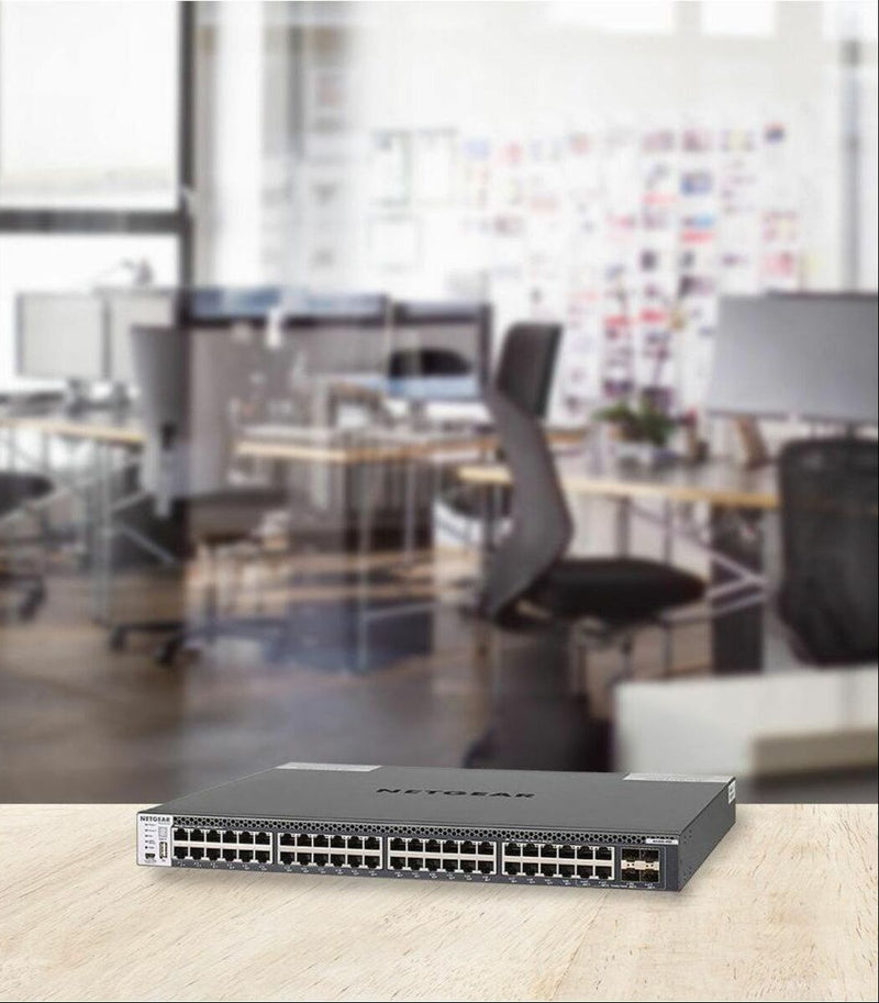 Netgear ProSafe M4300-48X installed in modern office environment showcasing practical deployment