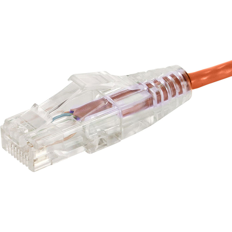 Detailed macro shot of transparent RJ-45 connector showing internal wiring and strain relief on orange ethernet cable