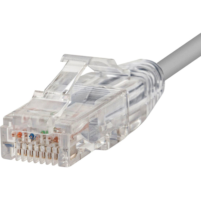 Detailed macro shot of SlimRun Cat6 RJ-45 connector showing internal pin arrangement and snagless boot design