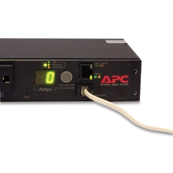 Close-up of APC AP7900B management interface showing digital display and network ports