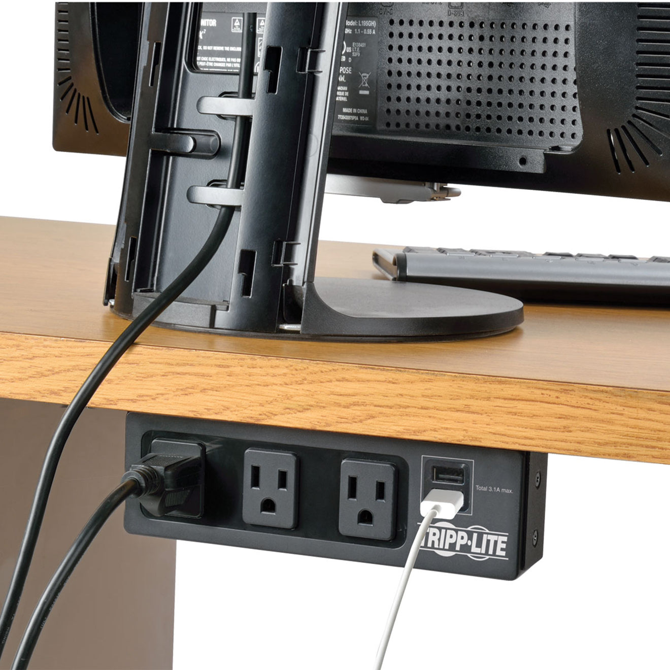 Under-desk mounted Tripp Lite surge protector showing practical installation-alternate-image3