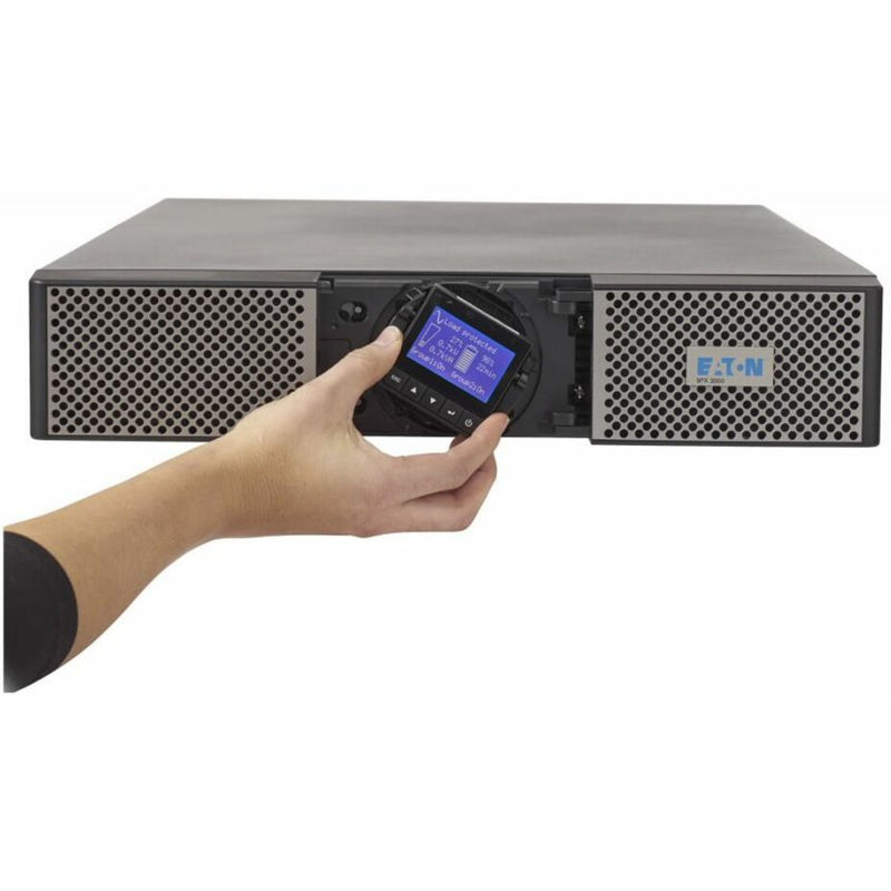 Hand adjusting the rotatable LCD display panel on Eaton 9PX UPS