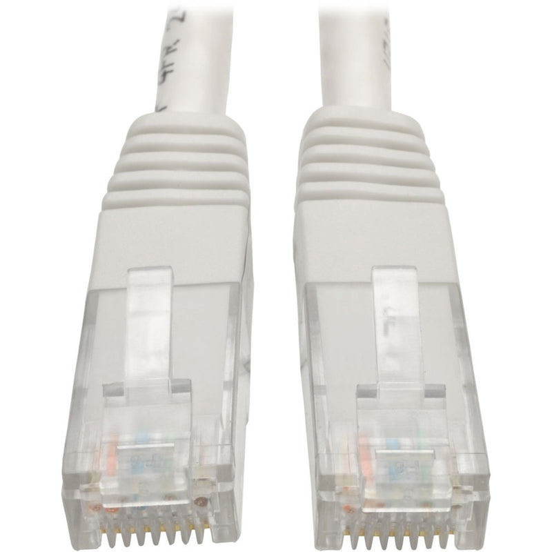 Close-up view of white Cat6 cable RJ45 connectors showing gold-plated pins and strain relief design