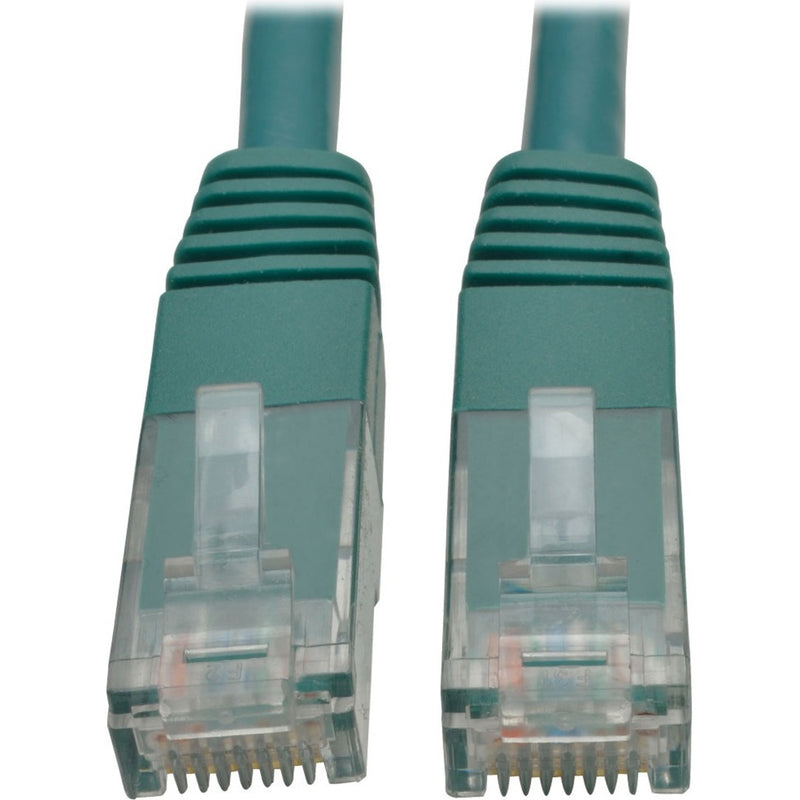 Close-up view of two green Cat6 RJ45 connectors showing gold-plated pins and transparent housing