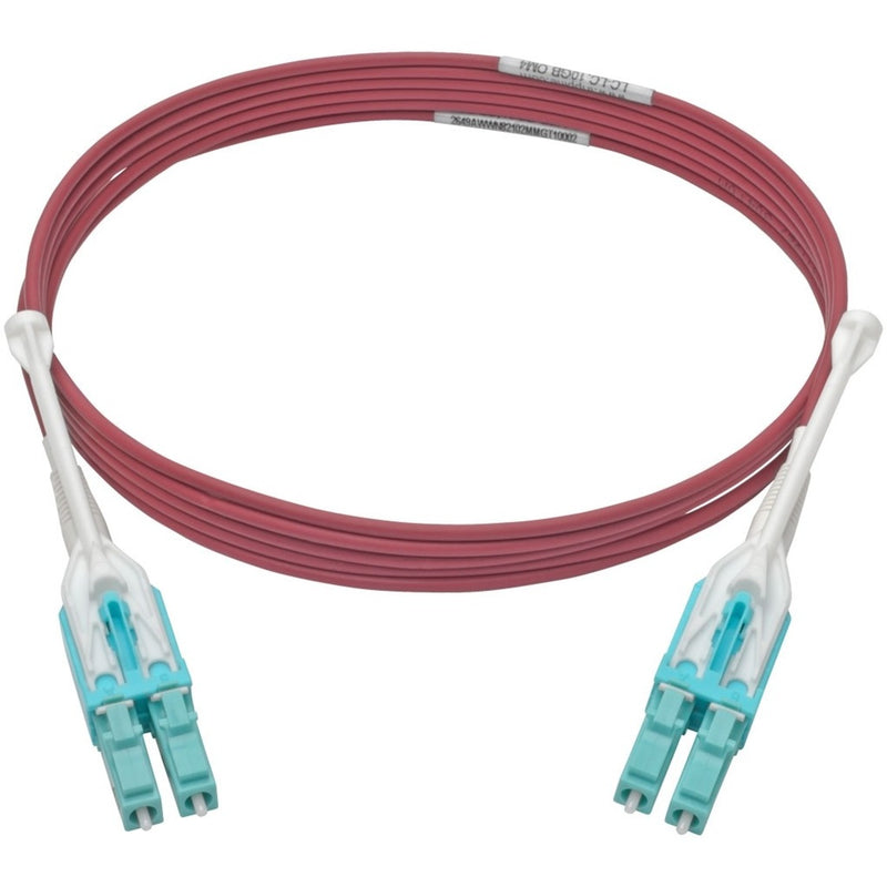 Full length view of magenta OM4 fiber optic cable with LC connectors on both ends