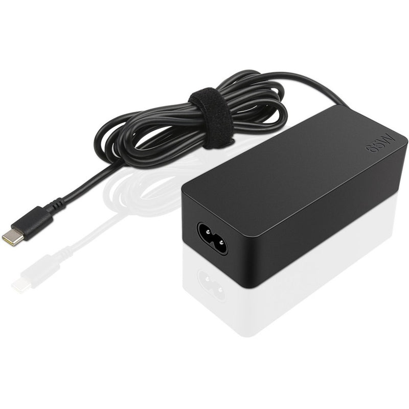 Lenovo 65W USB-C AC adapter with neatly wrapped cable and compact black housing