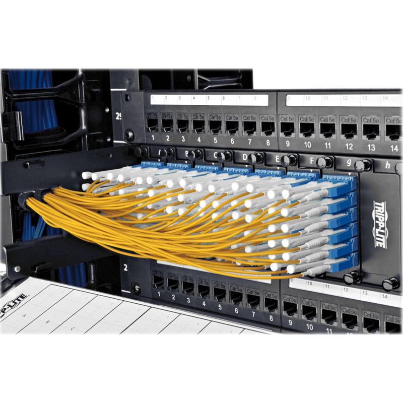 Multiple yellow N370-03M-T fiber cables neatly installed in a patch panel showing organized cable management