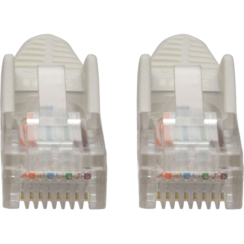 Detailed view of white snagless boots on RJ45 connectors