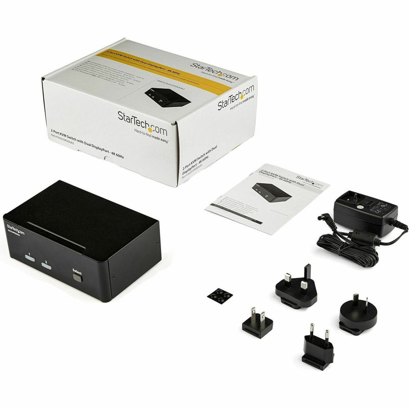 Product package contents showing KVM switch, power adapters, manual, and accessories