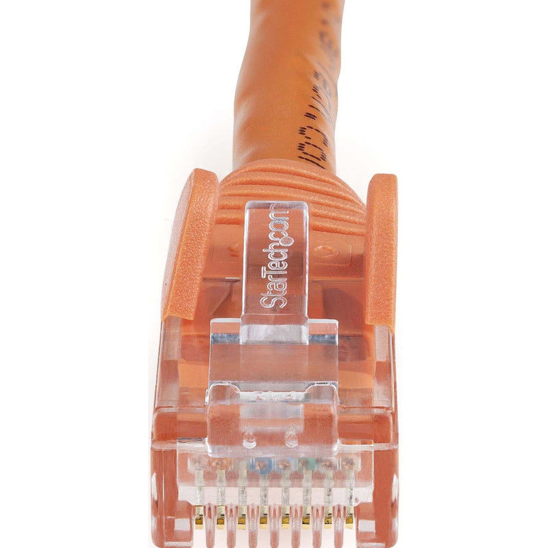 Macro shot of RJ45 connector showing detailed pin arrangement and StarTech.com branding