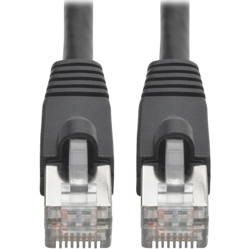 Close-up view of shielded RJ45 connectors with transparent housing and black strain relief boot on Cat6a cable