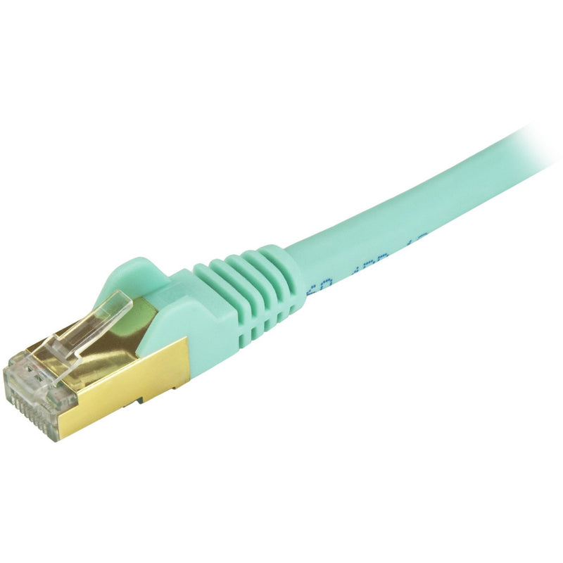 Detailed side view of aqua Cat6a ethernet connector highlighting gold-plated contacts and shielded construction