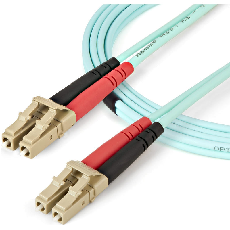 StarTech.com OM4 fiber cable showing flexibility and bend radius with LC connectors