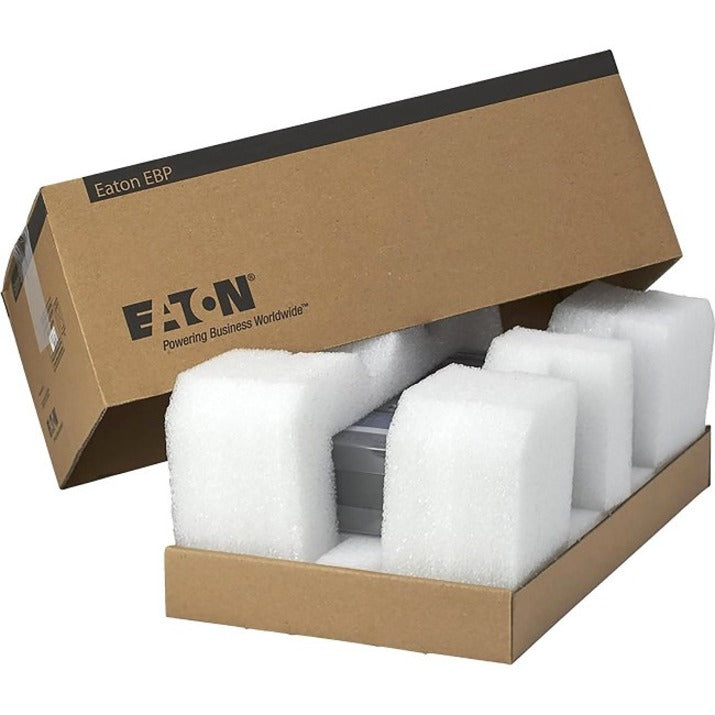 Eaton 744-A4058 UPS replacement battery cartridge shown in opened brown box with protective white foam inserts-alternate-image1