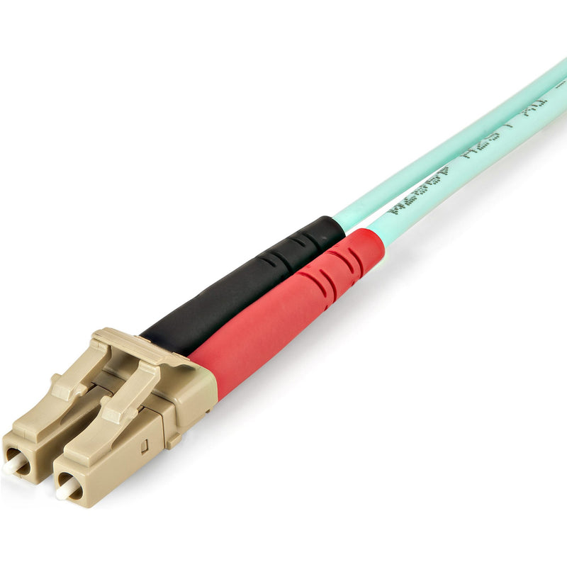 Side angle view of StarTech fiber optic cable highlighting OM4 aqua jacket and LC connector