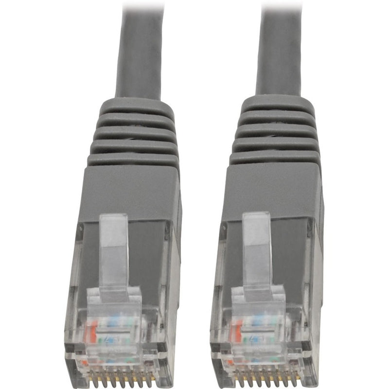 Close-up view of two RJ45 connectors showing gold-plated pins and strain relief design