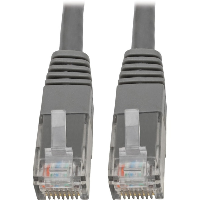 Close-up view of two gray RJ45 connectors with gold-plated pins and strain relief boots