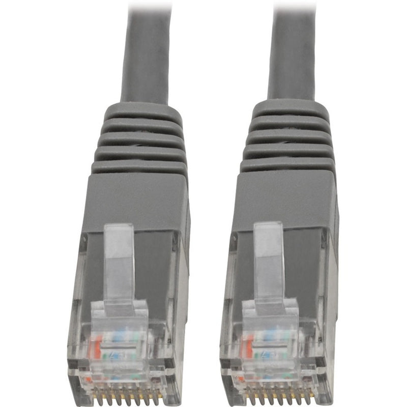 Close-up view of two RJ45 connectors with gold-plated pins and strain relief boots