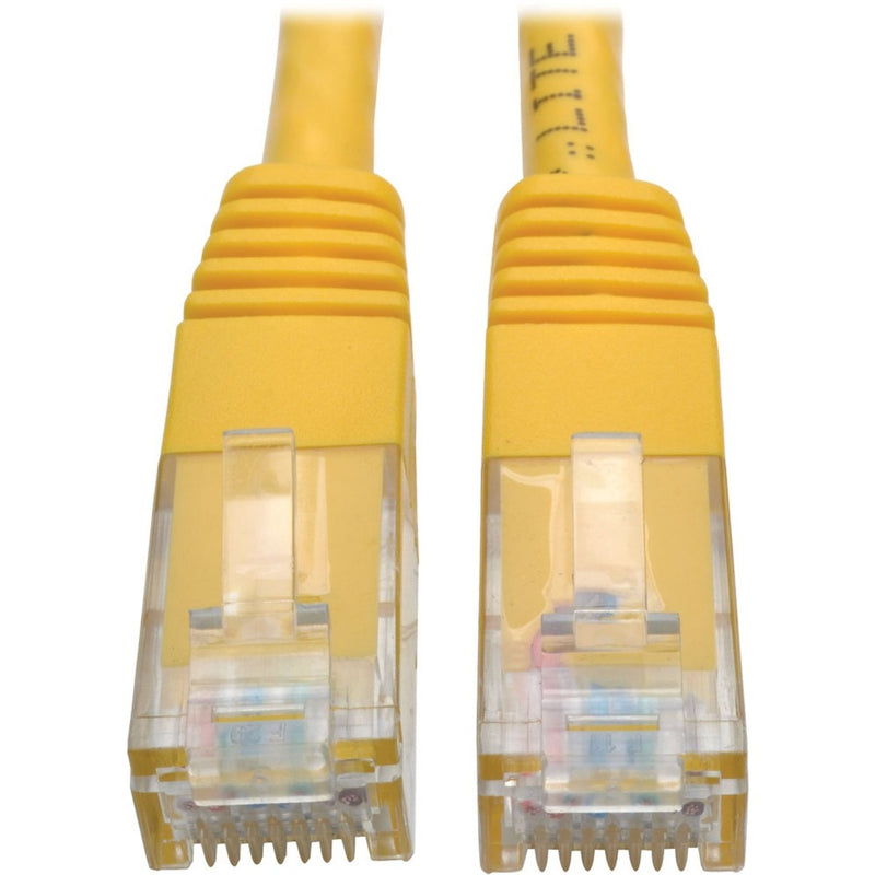 Close-up view of gold-plated RJ45 connectors on yellow Cat6 network cable showing transparent housing and pin arrangement