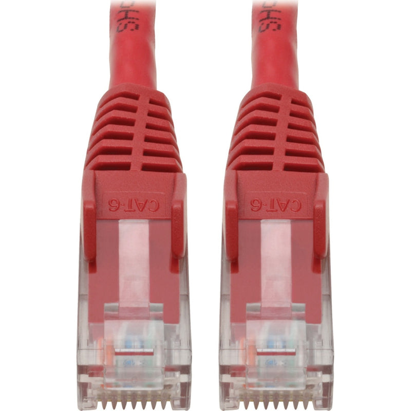 Close-up view of red Cat6 cable RJ45 connectors with gold-plated contacts and snagless boots