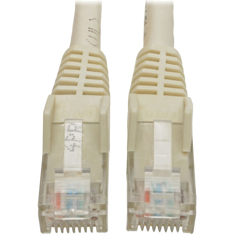 Close-up view of white Cat6 cable RJ45 connectors showing gold-plated contacts and strain relief design