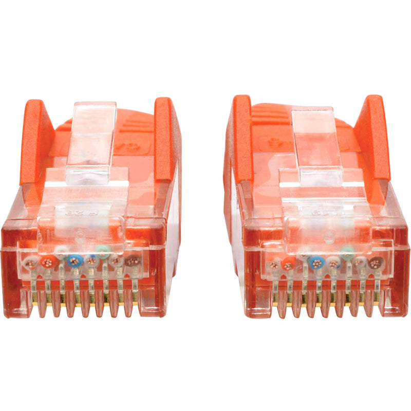 Detailed view of RJ45 connector pins and internal wiring configuration of orange Cat6 cable