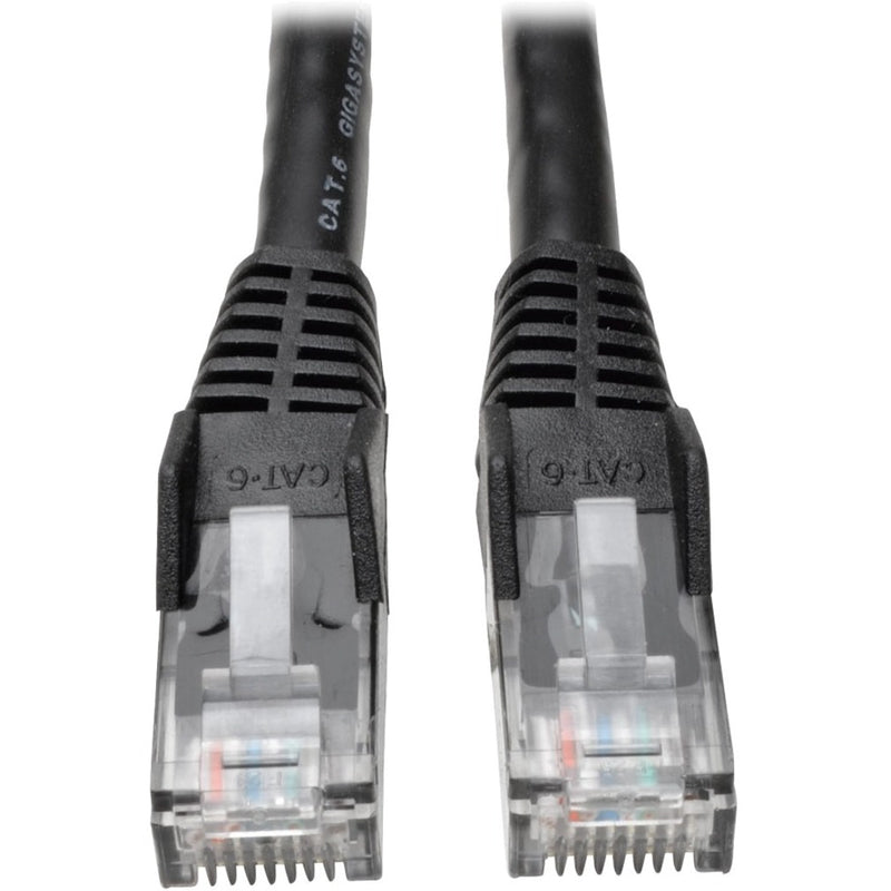 Close-up view of two transparent RJ45 connectors with black strain relief boots on Cat6 Ethernet cable