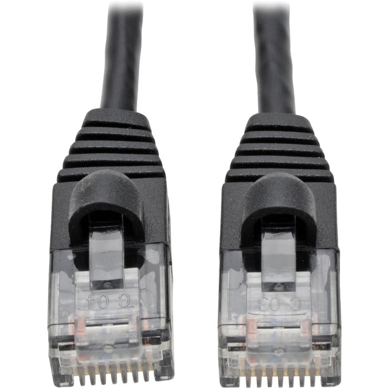 Close-up view of transparent RJ45 connectors with gold contacts and internal wiring visible