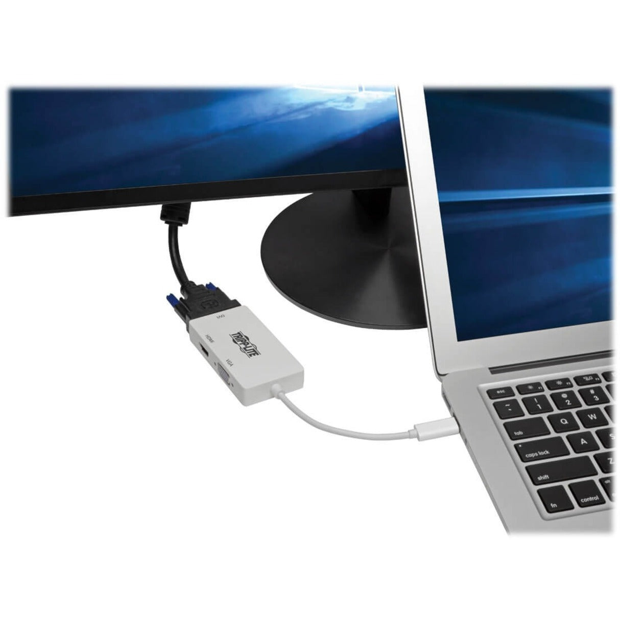 Tripp Lite adapter connected between a laptop and monitor showing real-world usage-alternate-image2