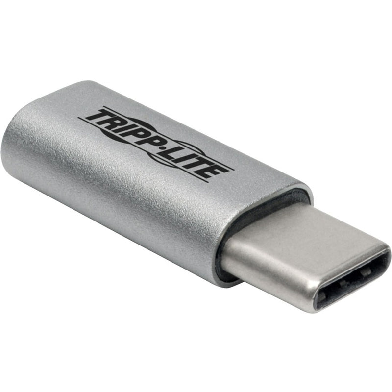 Close-up view of Tripp Lite USB-C adapter showing silver aluminum construction and USB-C connector