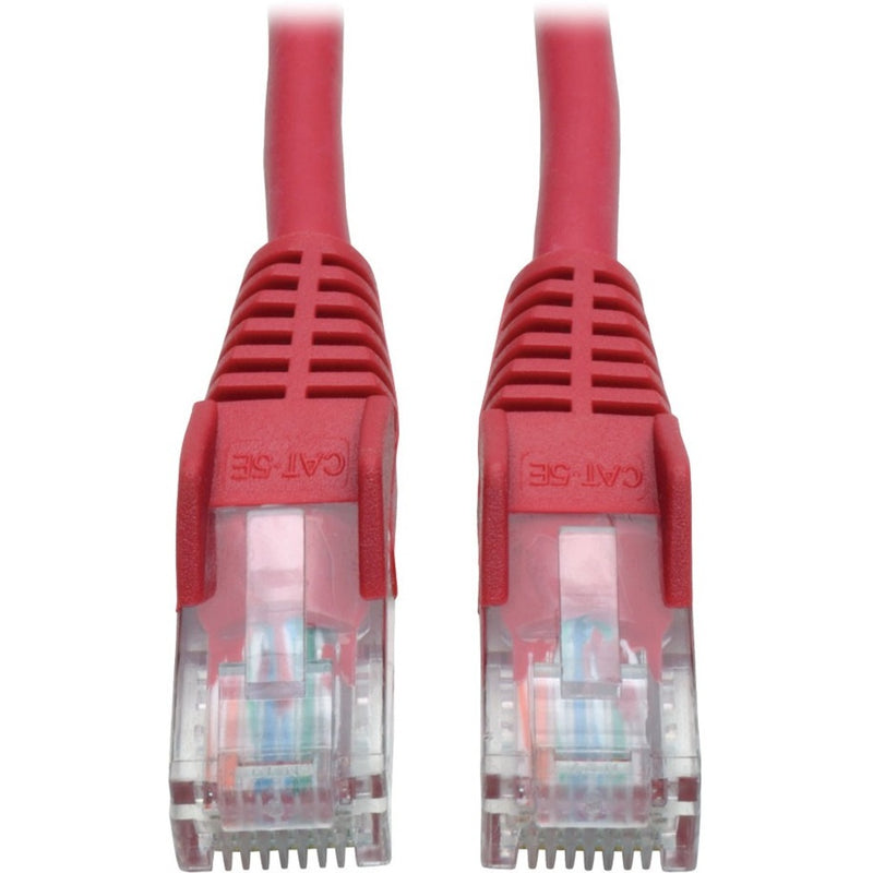 Close-up view of red Cat5e ethernet cable connectors showing snagless boots and gold-plated contacts