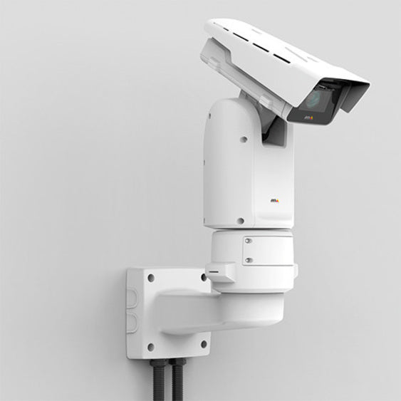 Profile view of AXIS T94J01A wall mount with installed camera showing cable management system