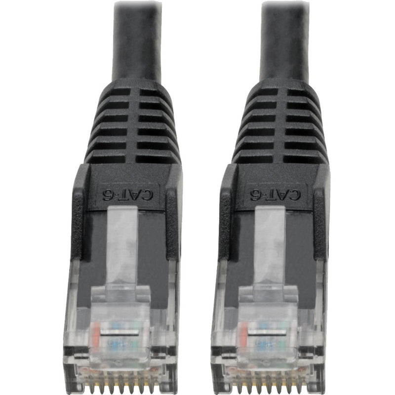 Close-up view of gold-plated RJ-45 connectors on Cat6 network cable with strain relief boots