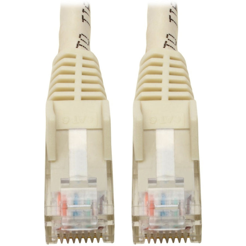 Close-up view of white Cat6 cable RJ45 connectors with gold-plated contacts and transparent housing