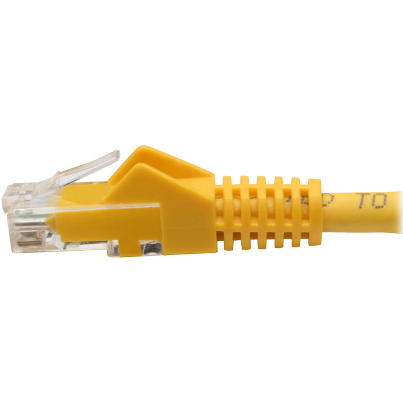 Close-up of transparent RJ45 connector showing internal wiring on yellow Cat6 cable