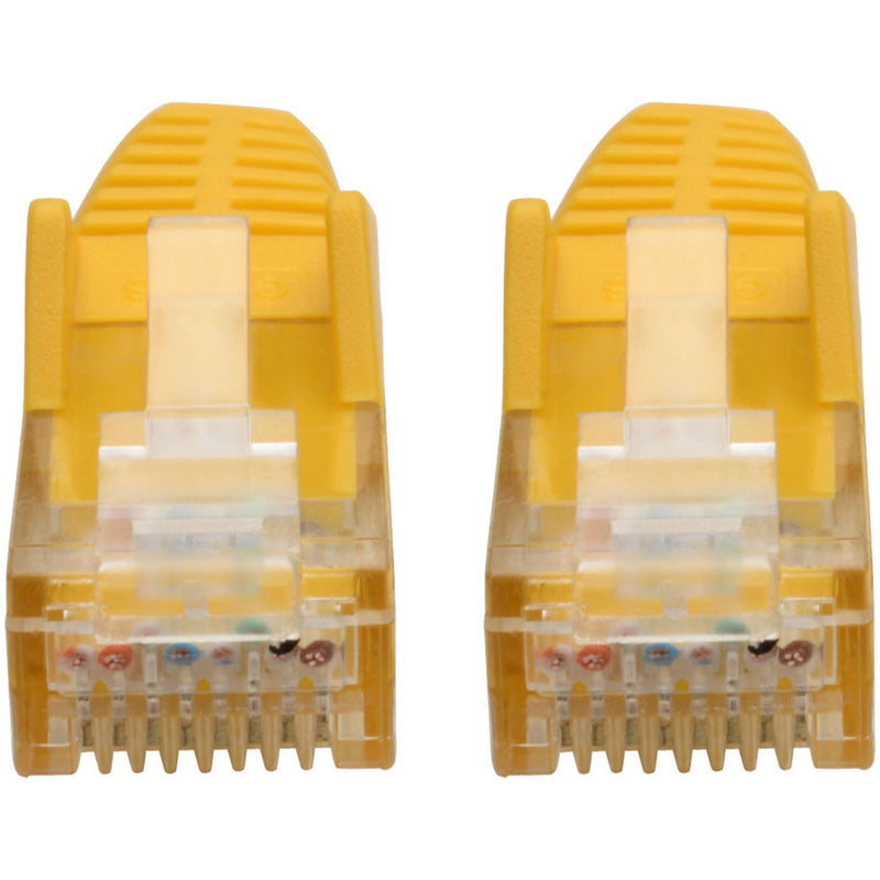 Detailed view of RJ45 connector internal wiring configuration on yellow Cat6 cable