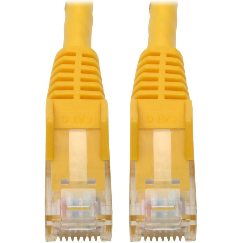 Close-up view of gold-plated RJ45 connectors on yellow Cat6 patch cable showing internal wiring