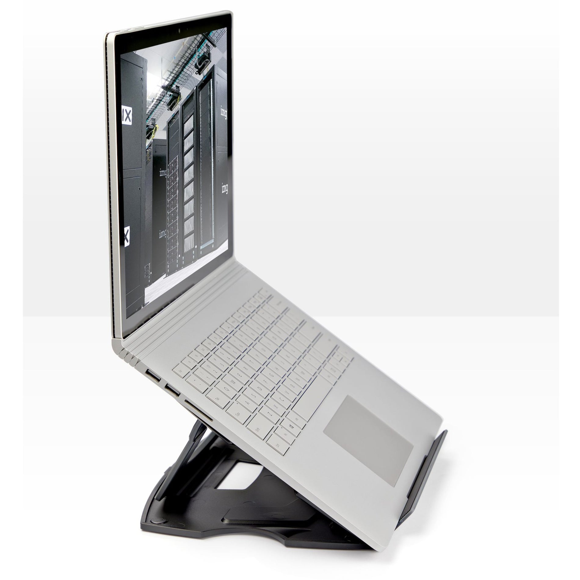 Side view of laptop positioned on stand showing elevated angle for ergonomic viewing-alternate-image3