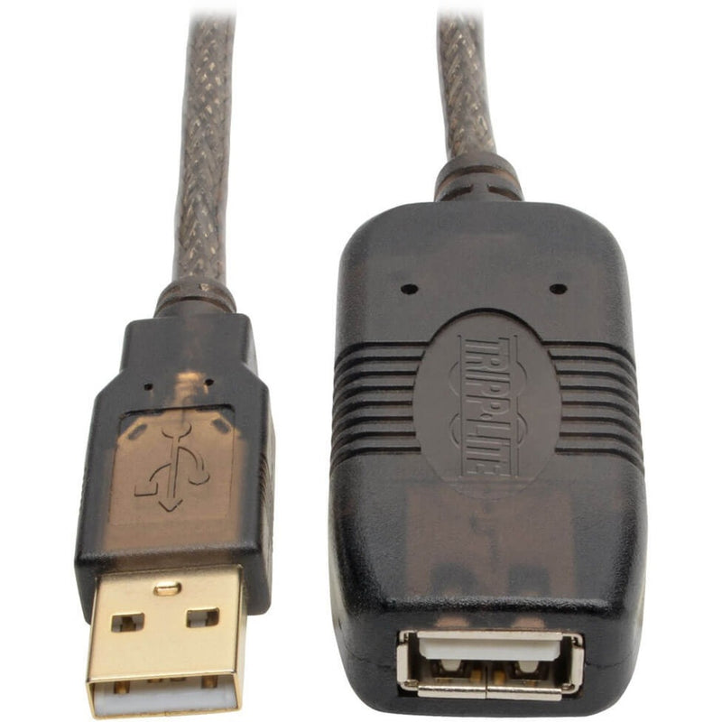 Close-up of gold-plated USB Type-A connector and signal booster housing on Tripp Lite active USB extension cable