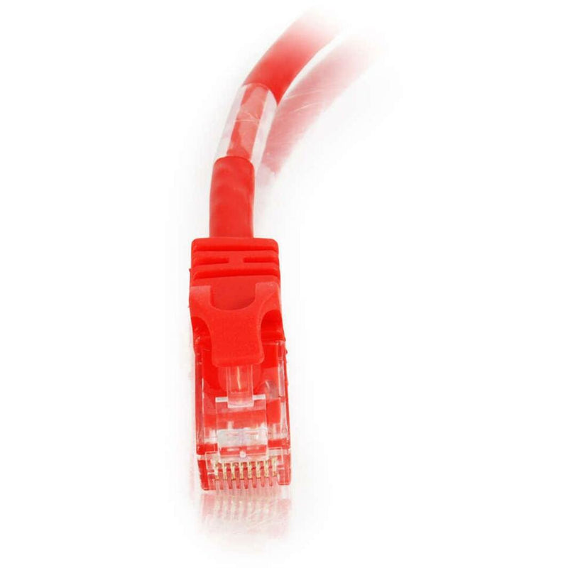 Close-up view of transparent RJ45 connector showing internal pin configuration of red Cat6 crossover cable