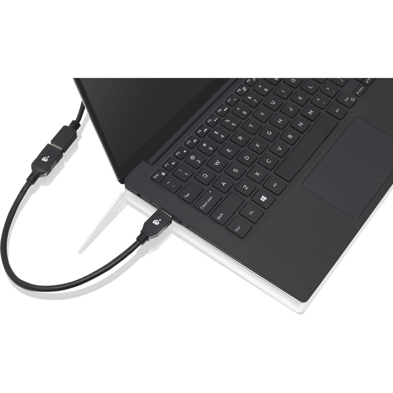 IOGEAR USB extension cable connected to a laptop showing practical usage scenario