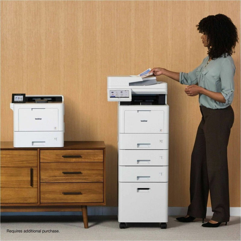 Office worker accessing Brother printer system with CB1010 cabinet in professional setting