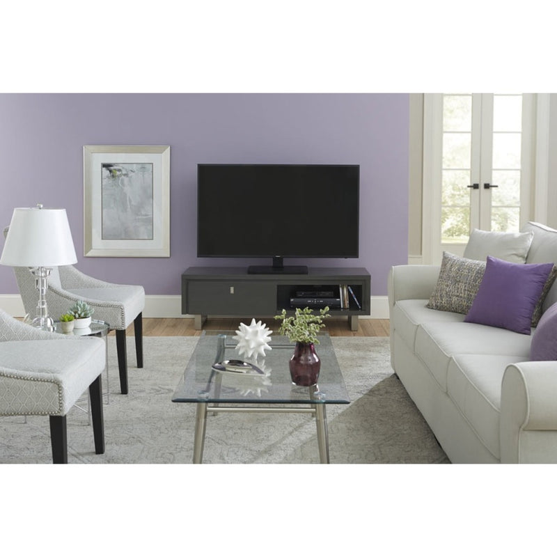 SANUS TV stand shown in contemporary living room setting