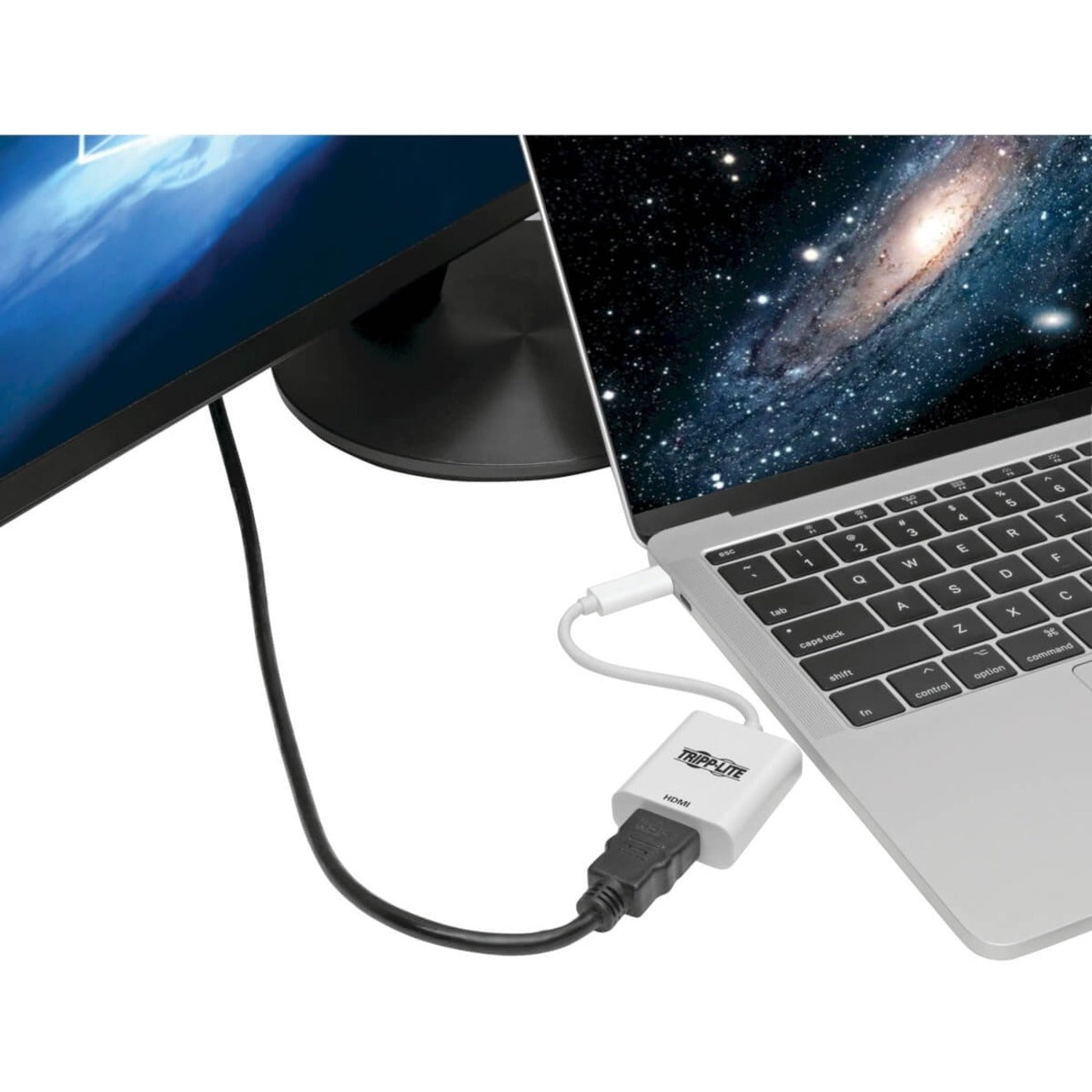 Tripp Lite adapter connected to MacBook with external monitor display showing space imagery-alternate-image2