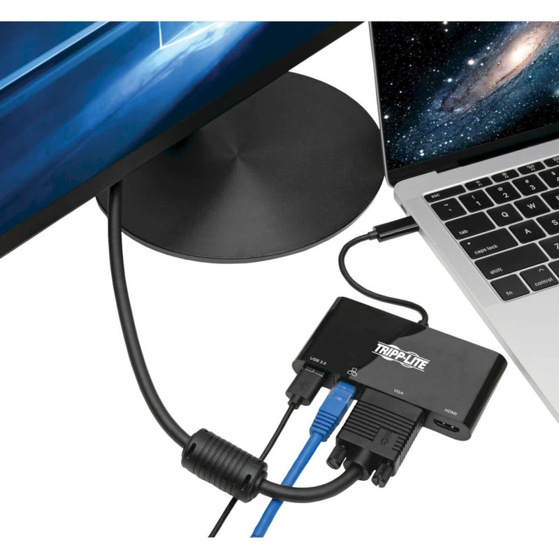 Tripp Lite docking station connected to laptop with monitor setup