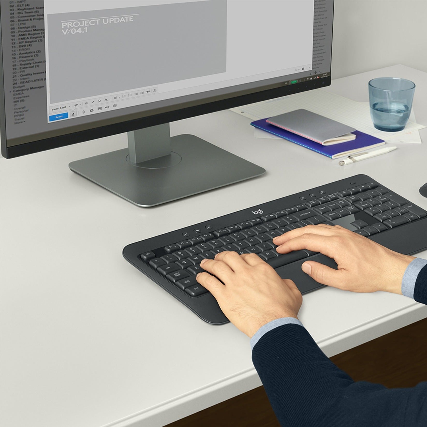 Person typing on Logitech MK540 keyboard in office setting-alternate-image4