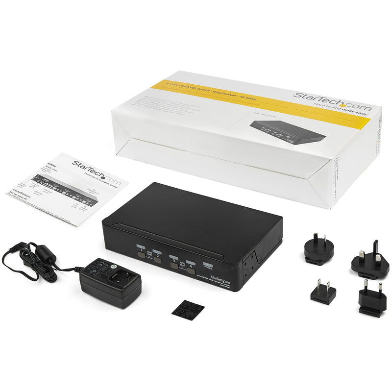 Product package contents showing KVM switch, power adapters, accessories, and documentation