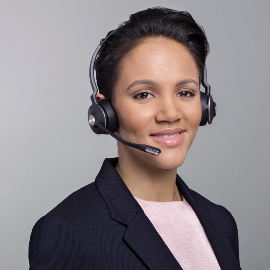 Professional wearing Jabra Engage 75 headset in office setting-alternate-image14