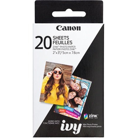 Canon ZINK Photo Paper pack containing 20 sheets of 2x3 inch zero ink photo paper, showing sample prints of people enjoying moments together