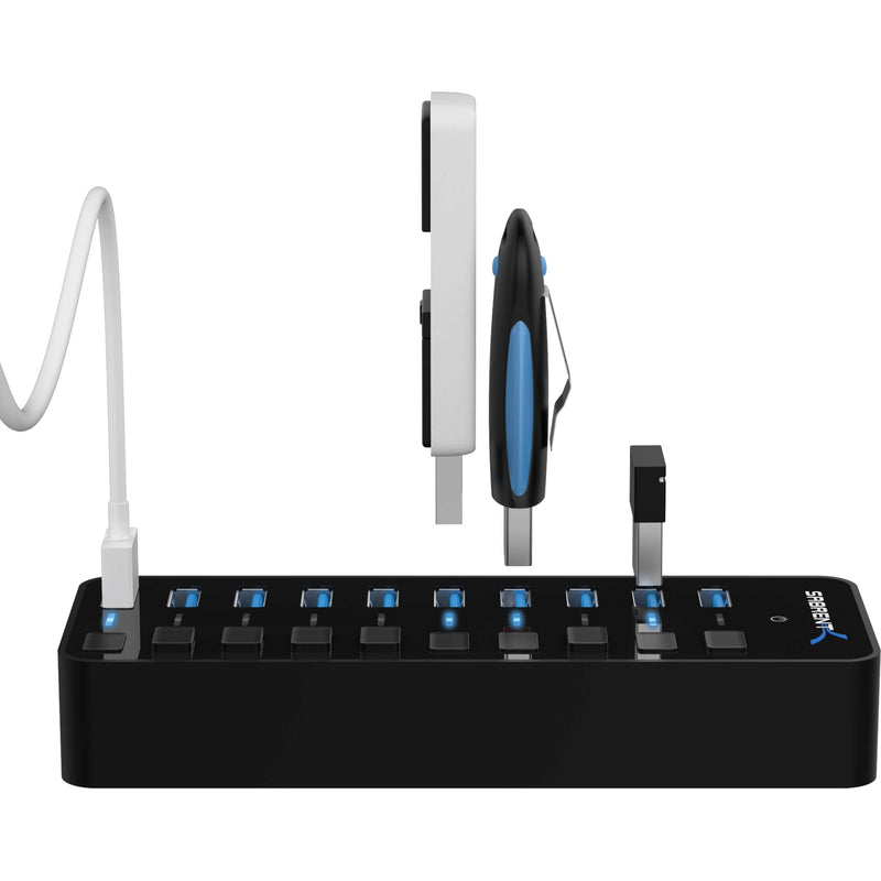 Multiple USB devices connected to Sabrent hub showing versatile connectivity options